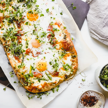 Spring Breakfast Pizza with Mozzarella, Asparagus and Prosciutto