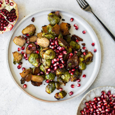 Caramelized Brussels Sprouts with Pancetta, Dates, + Pomegranates