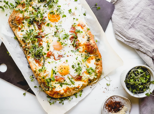 Spring Breakfast Pizza with Mozzarella, Asparagus and Prosciutto